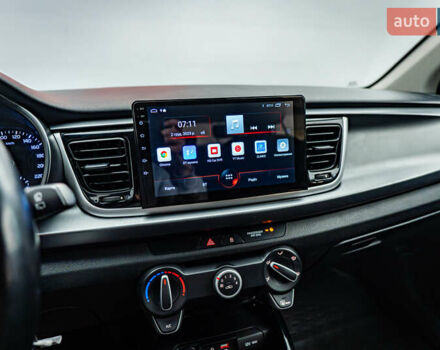 Чорний Кіа Ріо, об'ємом двигуна 1.2 л та пробігом 94 тис. км за 10904 $, фото 14 на Automoto.ua