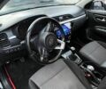 Чорний Кіа Ріо, об'ємом двигуна 1.6 л та пробігом 96 тис. км за 12500 $, фото 7 на Automoto.ua