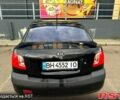 Черный Киа Рио, объемом двигателя 1.4 л и пробегом 252 тыс. км за 3600 $, фото 2 на Automoto.ua