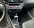 Черный Киа Рио, объемом двигателя 1.4 л и пробегом 250 тыс. км за 4999 $, фото 10 на Automoto.ua
