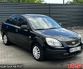 Черный Киа Рио, объемом двигателя 1.4 л и пробегом 250 тыс. км за 4999 $, фото 7 на Automoto.ua