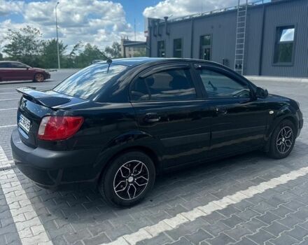 Чорний Кіа Ріо, об'ємом двигуна 1.4 л та пробігом 213 тис. км за 5100 $, фото 2 на Automoto.ua
