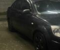 Чорний Кіа Ріо, об'ємом двигуна 1.4 л та пробігом 378 тис. км за 2750 $, фото 1 на Automoto.ua