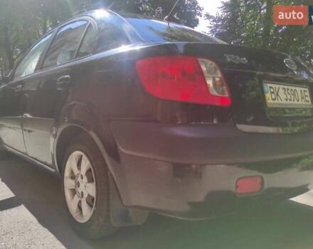 Чорний Кіа Ріо, об'ємом двигуна 1.4 л та пробігом 196 тис. км за 3600 $, фото 4 на Automoto.ua