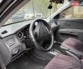 Чорний Кіа Ріо, об'ємом двигуна 1.4 л та пробігом 200 тис. км за 5000 $, фото 3 на Automoto.ua
