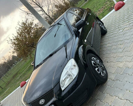 Черный Киа Рио, объемом двигателя 1.4 л и пробегом 297 тыс. км за 3999 $, фото 1 на Automoto.ua