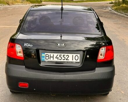 Чорний Кіа Ріо, об'ємом двигуна 1.4 л та пробігом 252 тис. км за 4750 $, фото 4 на Automoto.ua