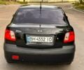 Чорний Кіа Ріо, об'ємом двигуна 1.4 л та пробігом 252 тис. км за 4750 $, фото 4 на Automoto.ua