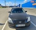 Черный Киа Рио, объемом двигателя 1.4 л и пробегом 187 тыс. км за 4300 $, фото 1 на Automoto.ua
