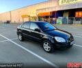 Черный Киа Рио, объемом двигателя 1.4 л и пробегом 187 тыс. км за 4200 $, фото 1 на Automoto.ua