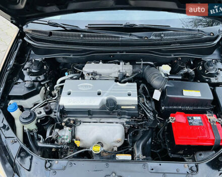 Черный Киа Рио, объемом двигателя 1.4 л и пробегом 297 тыс. км за 3999 $, фото 23 на Automoto.ua