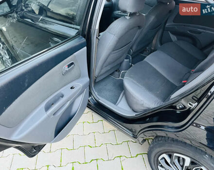 Черный Киа Рио, объемом двигателя 1.4 л и пробегом 297 тыс. км за 3999 $, фото 19 на Automoto.ua