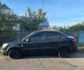 Черный Киа Рио, объемом двигателя 1.4 л и пробегом 378 тыс. км за 2650 $, фото 1 на Automoto.ua