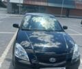 Чорний Кіа Ріо, об'ємом двигуна 1.4 л та пробігом 213 тис. км за 5100 $, фото 6 на Automoto.ua
