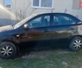 Черный Киа Рио, объемом двигателя 1.4 л и пробегом 350 тыс. км за 3100 $, фото 7 на Automoto.ua