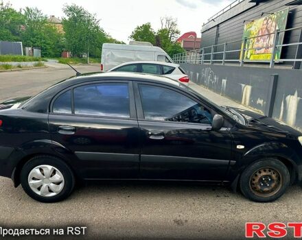 Черный Киа Рио, объемом двигателя 1.4 л и пробегом 252 тыс. км за 3600 $, фото 3 на Automoto.ua