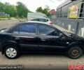 Черный Киа Рио, объемом двигателя 1.4 л и пробегом 252 тыс. км за 3600 $, фото 3 на Automoto.ua