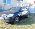 Черный Киа Рио, объемом двигателя 1.4 л и пробегом 350 тыс. км за 3100 $, фото 1 на Automoto.ua