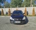 Черный Киа Рио, объемом двигателя 1.4 л и пробегом 270 тыс. км за 5000 $, фото 1 на Automoto.ua