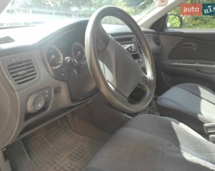 Чорний Кіа Ріо, об'ємом двигуна 1.4 л та пробігом 196 тис. км за 3600 $, фото 6 на Automoto.ua