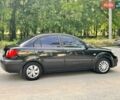 Чорний Кіа Ріо, об'ємом двигуна 1.4 л та пробігом 252 тис. км за 4750 $, фото 13 на Automoto.ua