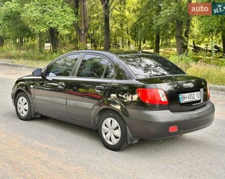 Чорний Кіа Ріо, об'ємом двигуна 1.4 л та пробігом 252 тис. км за 4750 $, фото 6 на Automoto.ua