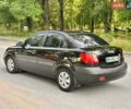 Чорний Кіа Ріо, об'ємом двигуна 1.4 л та пробігом 252 тис. км за 4750 $, фото 6 на Automoto.ua