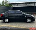 Черный Киа Рио, объемом двигателя 1.4 л и пробегом 250 тыс. км за 4999 $, фото 5 на Automoto.ua