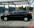 Черный Киа Рио, объемом двигателя 1.4 л и пробегом 250 тыс. км за 4999 $, фото 1 на Automoto.ua