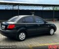 Черный Киа Рио, объемом двигателя 1.4 л и пробегом 250 тыс. км за 4999 $, фото 4 на Automoto.ua