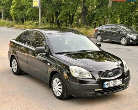 Чорний Кіа Ріо, об'ємом двигуна 1.4 л та пробігом 252 тис. км за 4750 $, фото 8 на Automoto.ua