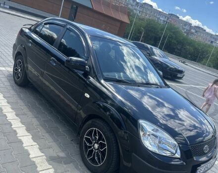 Черный Киа Рио, объемом двигателя 1.4 л и пробегом 213 тыс. км за 5124 $, фото 1 на Automoto.ua