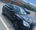Черный Киа Рио, объемом двигателя 1.4 л и пробегом 213 тыс. км за 5124 $, фото 1 на Automoto.ua