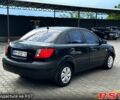 Черный Киа Рио, объемом двигателя 1.4 л и пробегом 250 тыс. км за 4999 $, фото 3 на Automoto.ua