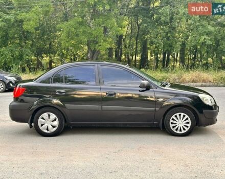Чорний Кіа Ріо, об'ємом двигуна 1.4 л та пробігом 252 тис. км за 4750 $, фото 12 на Automoto.ua