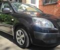 Чорний Кіа Ріо, об'ємом двигуна 1.4 л та пробігом 196 тис. км за 3600 $, фото 1 на Automoto.ua