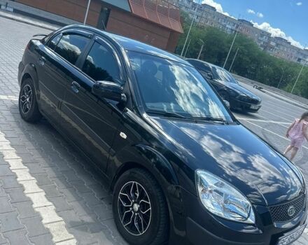 Чорний Кіа Ріо, об'ємом двигуна 1.4 л та пробігом 213 тис. км за 5100 $, фото 7 на Automoto.ua