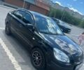 Чорний Кіа Ріо, об'ємом двигуна 1.4 л та пробігом 213 тис. км за 5100 $, фото 7 на Automoto.ua