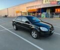 Черный Киа Рио, объемом двигателя 1.4 л и пробегом 187 тыс. км за 4200 $, фото 1 на Automoto.ua