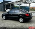 Черный Киа Рио, объемом двигателя 1.4 л и пробегом 250 тыс. км за 4999 $, фото 2 на Automoto.ua