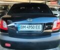 Черный Киа Рио, объемом двигателя 1.4 л и пробегом 187 тыс. км за 4200 $, фото 2 на Automoto.ua