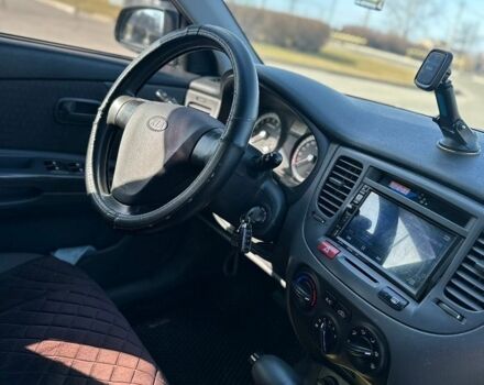 Чорний Кіа Ріо, об'ємом двигуна 1.4 л та пробігом 213 тис. км за 5100 $, фото 26 на Automoto.ua