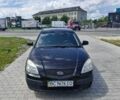 Чорний Кіа Ріо, об'ємом двигуна 1.4 л та пробігом 184 тис. км за 4500 $, фото 1 на Automoto.ua