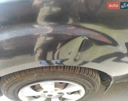 Чорний Кіа Ріо, об'ємом двигуна 1.4 л та пробігом 196 тис. км за 3600 $, фото 11 на Automoto.ua