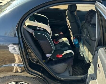 Чорний Кіа Ріо, об'ємом двигуна 1.4 л та пробігом 213 тис. км за 5100 $, фото 23 на Automoto.ua