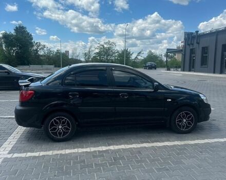 Чорний Кіа Ріо, об'ємом двигуна 1.4 л та пробігом 213 тис. км за 5100 $, фото 1 на Automoto.ua