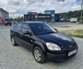 Черный Киа Рио, объемом двигателя 1.4 л и пробегом 184 тыс. км за 4500 $, фото 2 на Automoto.ua