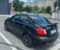 Чорний Кіа Ріо, об'ємом двигуна 1.4 л та пробігом 213 тис. км за 5100 $, фото 3 на Automoto.ua