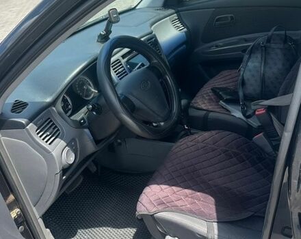 Чорний Кіа Ріо, об'ємом двигуна 1.4 л та пробігом 213 тис. км за 5100 $, фото 8 на Automoto.ua