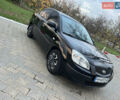 Черный Киа Рио, объемом двигателя 1.4 л и пробегом 297 тыс. км за 3999 $, фото 5 на Automoto.ua